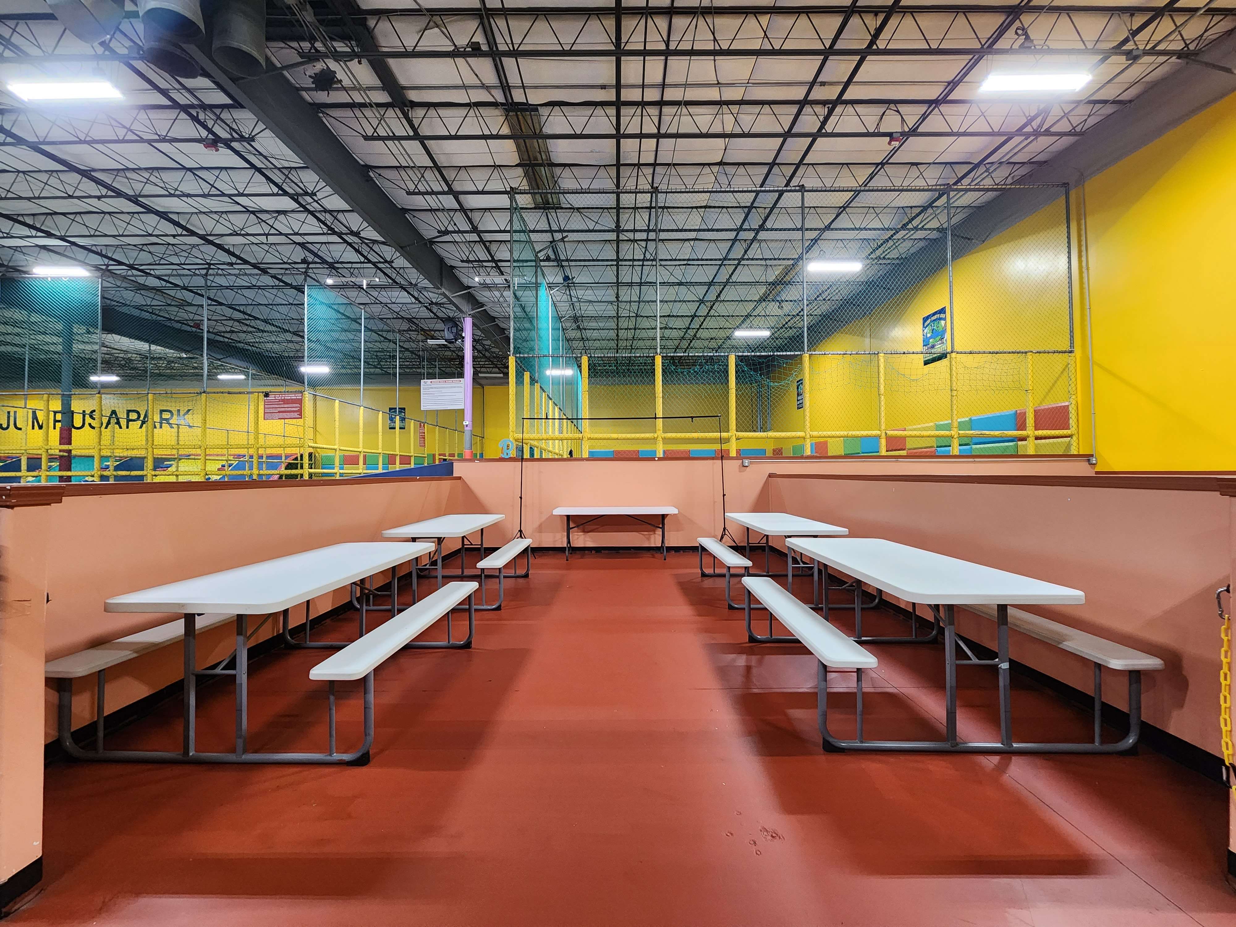 Jump Party USA has 6 open view party rooms with 4 picnic tables and one center table for 30 people